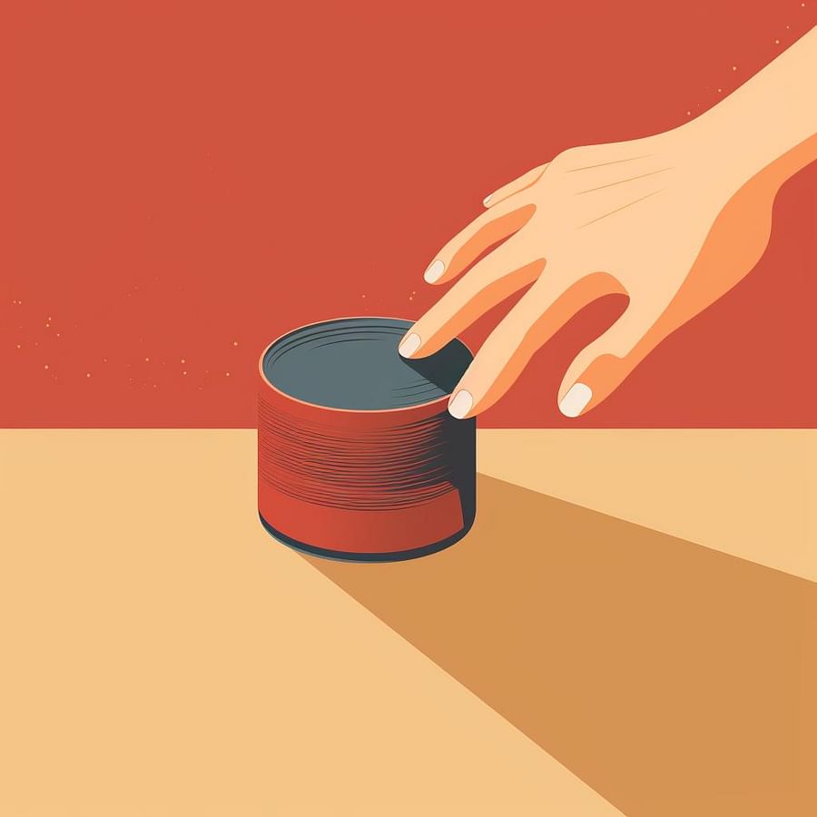 A hand holding a piece of sandpaper and smoothing the edges of a can.
